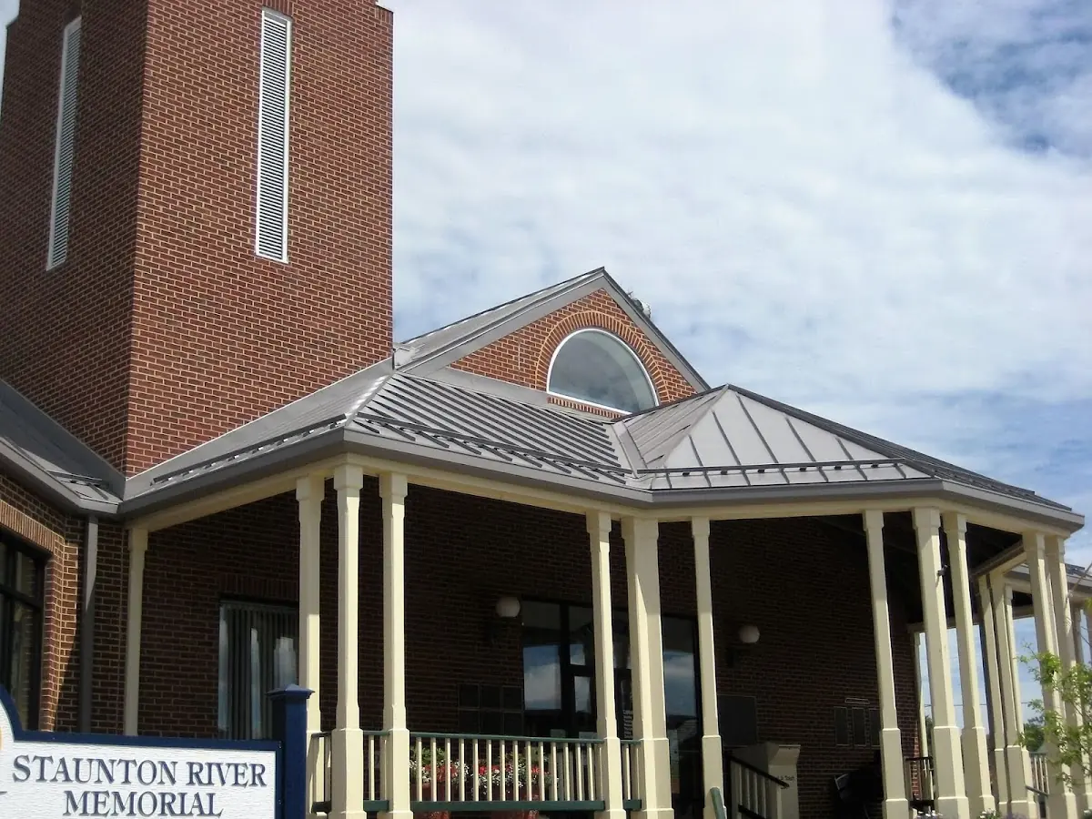 Skilled roofing craftsmen working on a residential roof in Washington Crossing